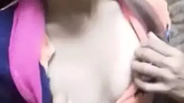 Adorable Desi cutie flashes curious friend her XXX tits in public