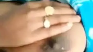 Desi Bhabhi's milking tits exposed in the close-up self-made XXX video