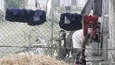 Village guy replenishes XXX collection with a Desi bathing outdoors